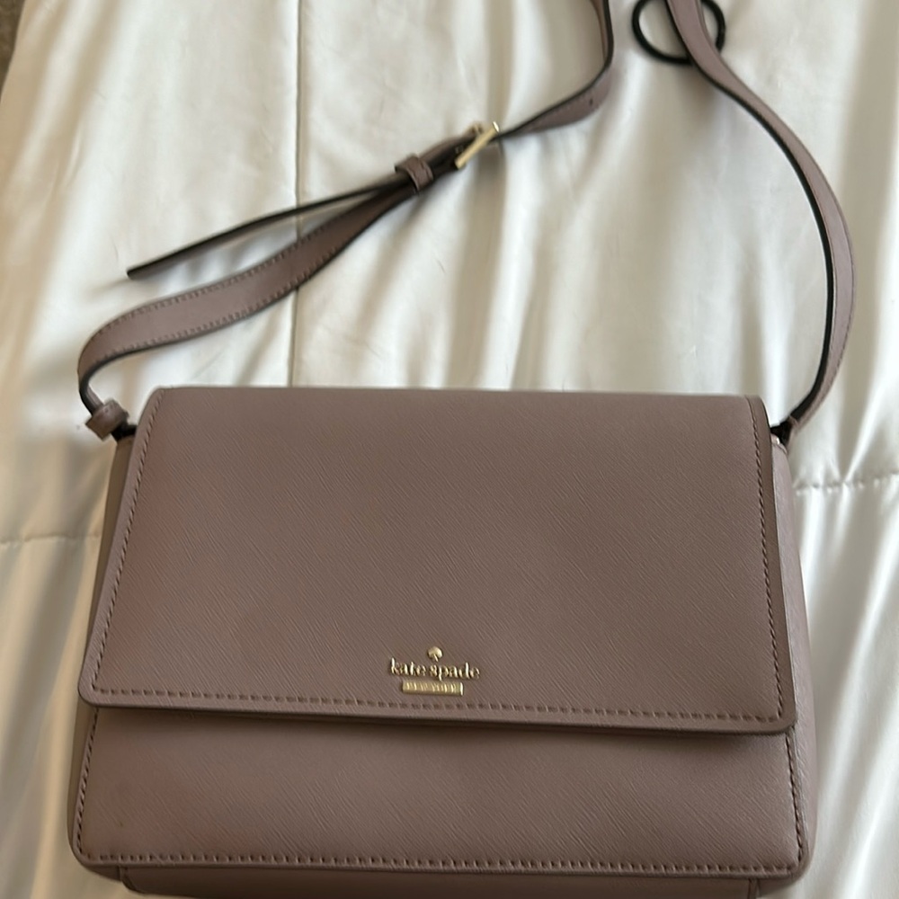 2019 purple small Kate Spade crossbody purse.